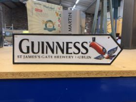 A CAST METAL GUINNESS SIGN