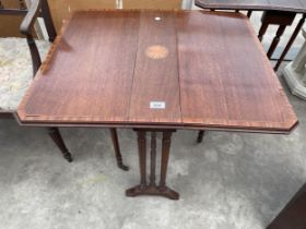 AN EDWARDIAN MAHOGANY AND INLAID SUTHERLAND TABLE WITH CANTED CORNERS