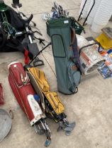 THREE VINTAGE GOLF BAGS AND AN ASSORTMENT OF VINTAGE GOLF CLUBS