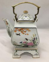 A FRANKLIN PORCELAIN 'THE BIRDS AND FLOWERS OF THE ORIENT' TEAPOT BY NAOKO NOBATA WITH 22CT GOLD