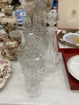 FIVE CUT GLASS DECANTERS OF VARYING SIZES