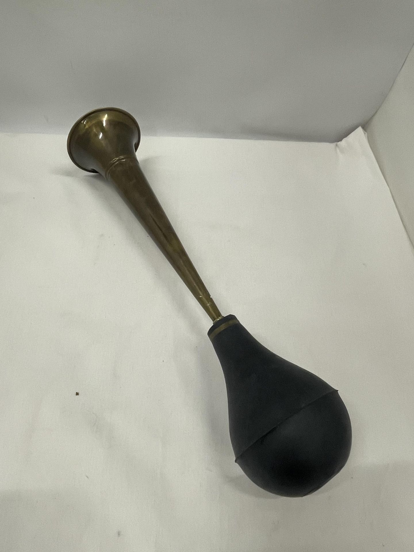 A VINTAGE STYLE BRASS CAR HORN