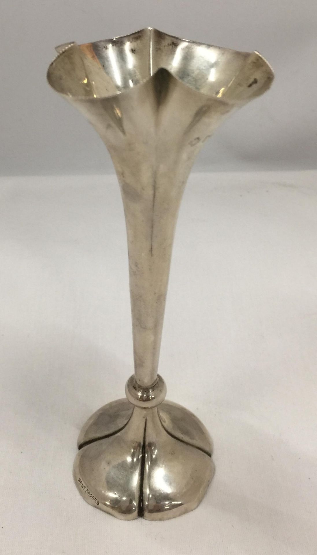 A LONDON HALLMARKED SILVER BUD VASE, WEIGHTED BASE