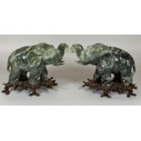 A PAIR OF GREAT QUALITY ORIENTAL CHINESE JADE JADEITE HARDSTONE ELEPHANTS ON CARVED WOODEN BASES,