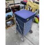 A PUSH ALONG SHOPPING BAG/TROLLEY