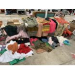 A LARGE QUANTITY OF VINTAGE AND RETRO CLOTHING