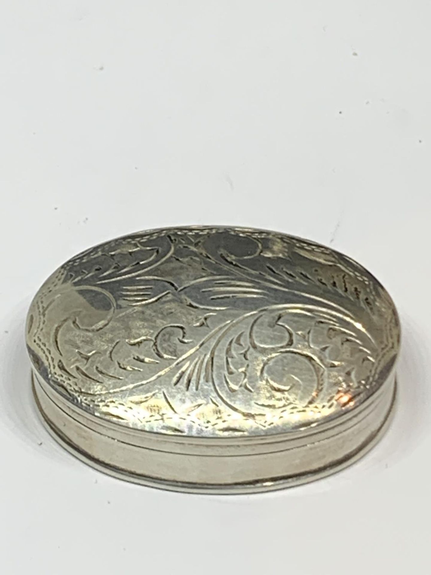 A SILVER PILL BOX