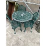 A CAST ALLOY BISTRO TABLE COMPRISING OF A ROUND TABLE AND THREE CHAIRS