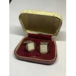 A PAIR OF SILVER CUFFLINKS, BOXED