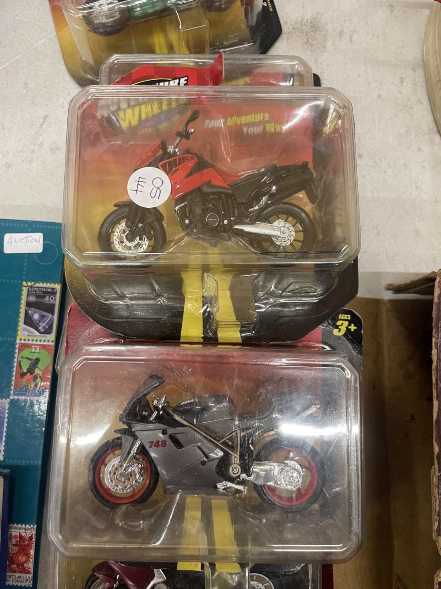 SEVEN DIE-CAST BOXED RACING BIKES - Image 4 of 4