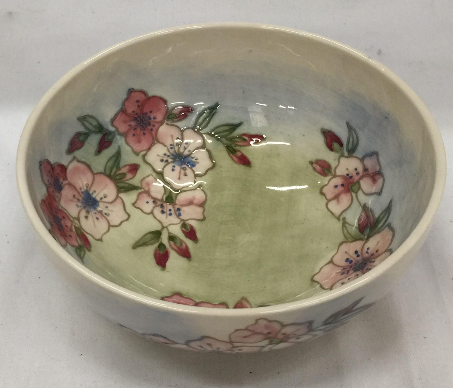 A MOORCROFT 'SPRING BLOSSOM' PATTERN BOWL DESIGNED BY SALLY TUFFIN