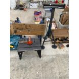 AN ASSORTMENT OF ITEMS TO INCLUDE A FOLDING WORK MATE AND A WOOD ROLLER STAND ETC