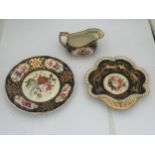 A GROUP OF THREE 19TH CENTURY BLUE AND GILT DESIGN CERAMICS WITH HAND PAINTED FLORAL SCENES,