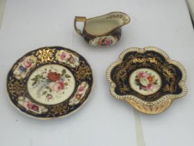 A GROUP OF THREE 19TH CENTURY BLUE AND GILT DESIGN CERAMICS WITH HAND PAINTED FLORAL SCENES,