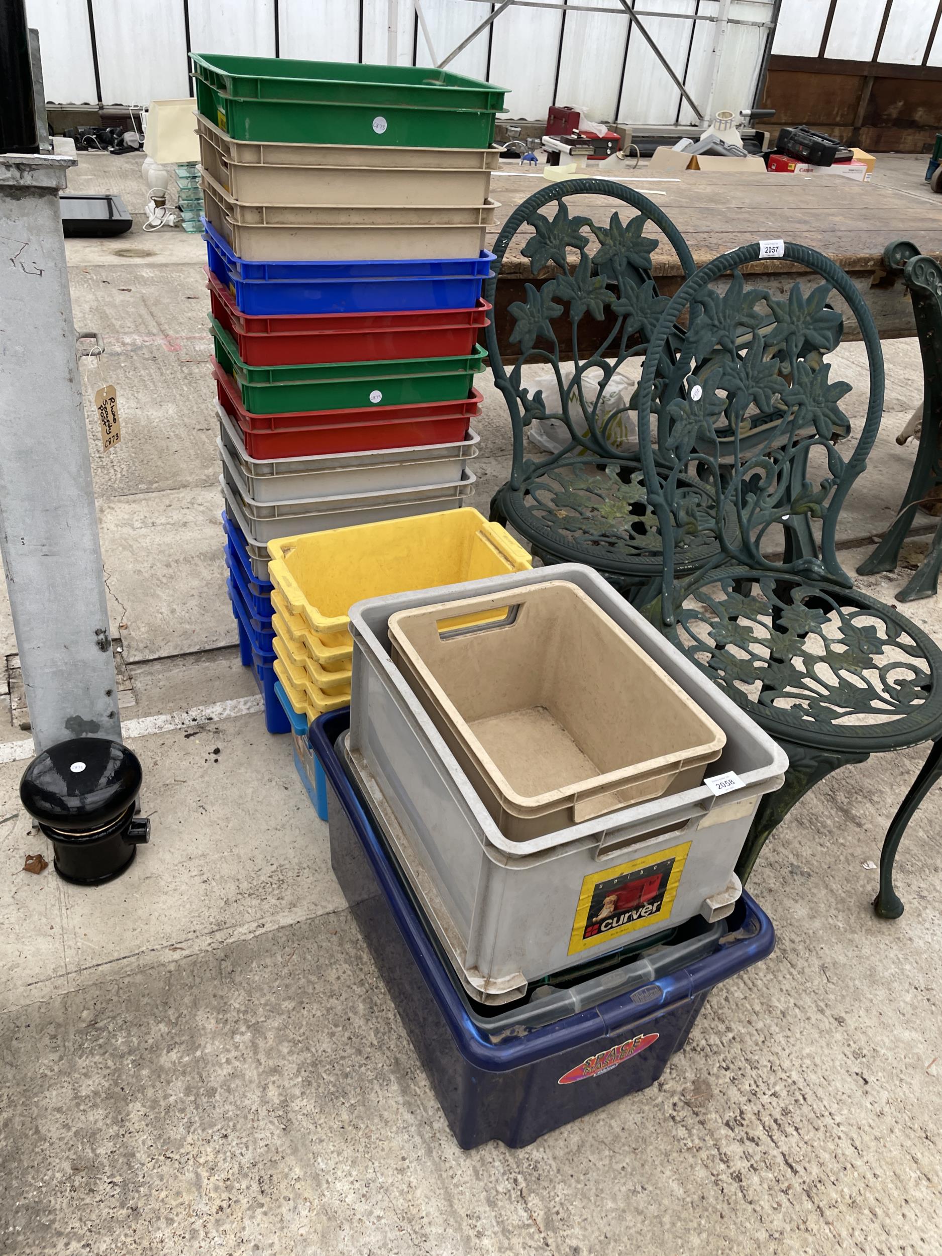 AN ASSORTMENT OF PLASTIC STORAGE BOXES
