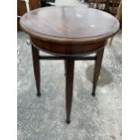 A 21" DIAMETER MAHOGANY PUB TABLE