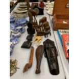 A COLLECTION OF TREEN TRIBAL WOODEN ITEMS, ELEPHANTS, MASK ETC