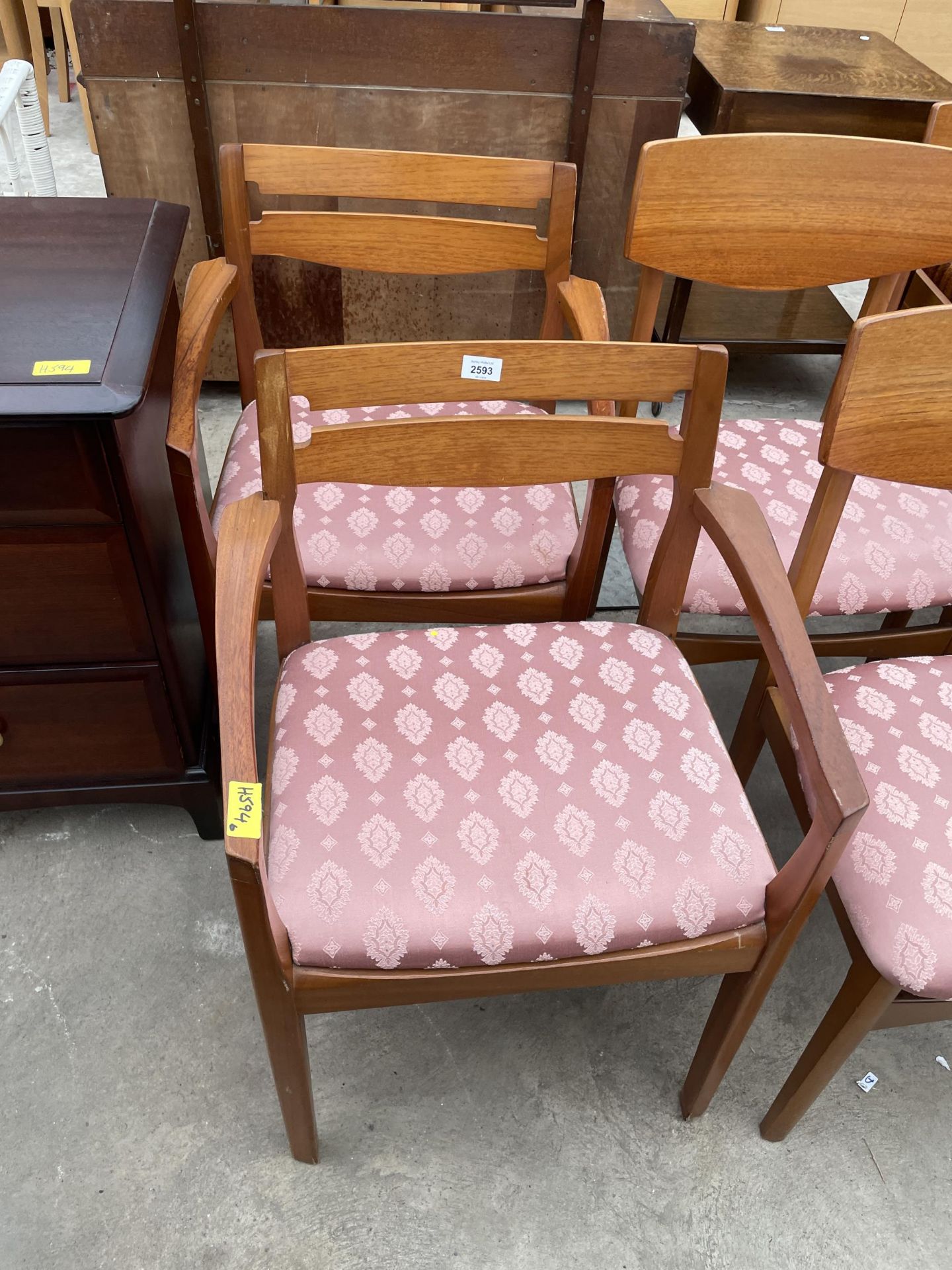 A PAIR OF RETRO TEAK 'NATHAN' CARVER CHAIRS