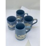 A GROUP OF FOUR WEDGWOOD PALE BLUE JASPERWARE MUGS