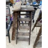TWO VINTAGE WOODEN FOUR RUNG STEP LADDERS