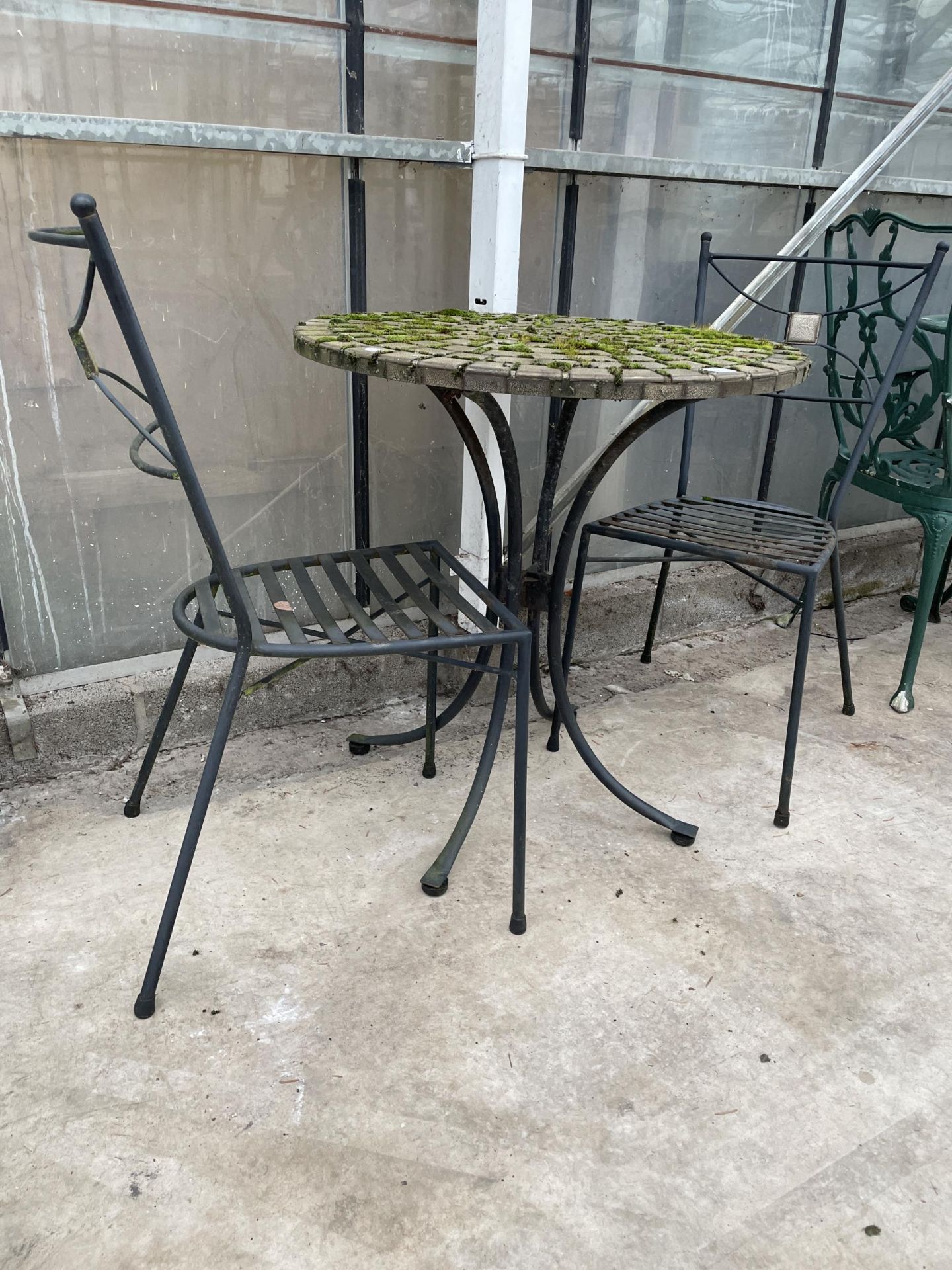 A BISTRO SET COMPRISING OF A ROUND TILE TOP TABLE AND TWO METAL CHAIRS - Image 2 of 3