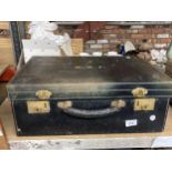 A LARGE VINTAGE LEATHER LADIES VANITY CASE WITH COMPARTMENTS FOR BOTTLES, ETC, MONOGRAMMED TO THE