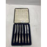 A VINTAGE SET OF SIX SILVER HANDLED KNIVES, BOXED