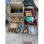 A LARGE QUANTITY OF TOYS AND GAMES TO INCLUDE CHESS, POKER AND BACK GAMMON ETC