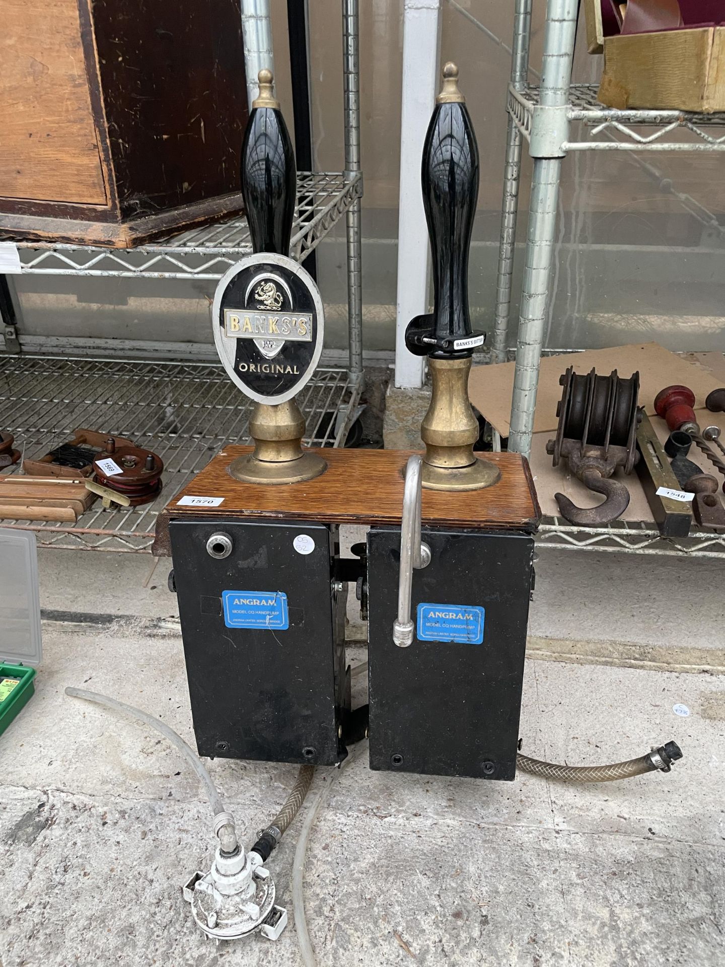 A VINTAGE REAL ALE BRASS AND WOODEN HAND BEER PUMP