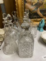A MIXED LOT OF GLASSWARE TO INCLUDE DECANTERS ETC