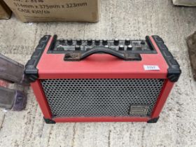 A ROLAND STREET CUBE GUITAR AMPLIFIER BATTERY OR MAINS OPERATED