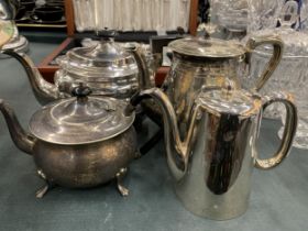 FOUR SILVER PLATED TEAPOTS