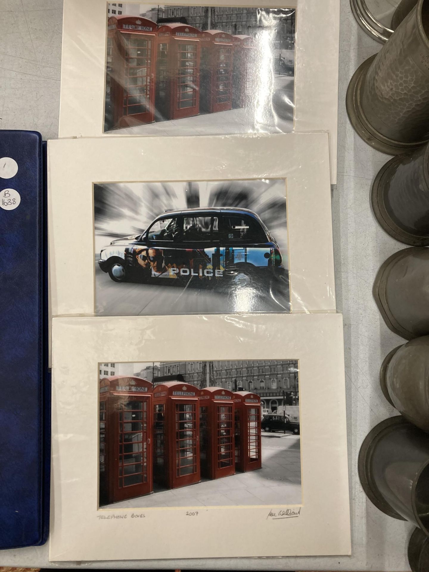 A GROUP OF SIGNED MOUNTED COLOUR PRINTS OF PHONE BOXES