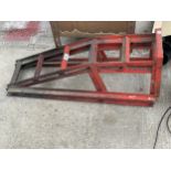 A PAIR OF METAL CAR RAMPS