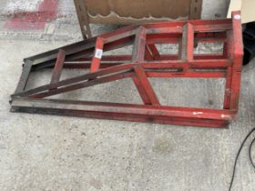 A PAIR OF METAL CAR RAMPS