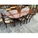 A MAHOGANY REGENCY STYLE TWIN PEDESTAL EXTENDING DINING TABLE, 64 X 39" (LEAF 20") AND SIX ROPE BACK