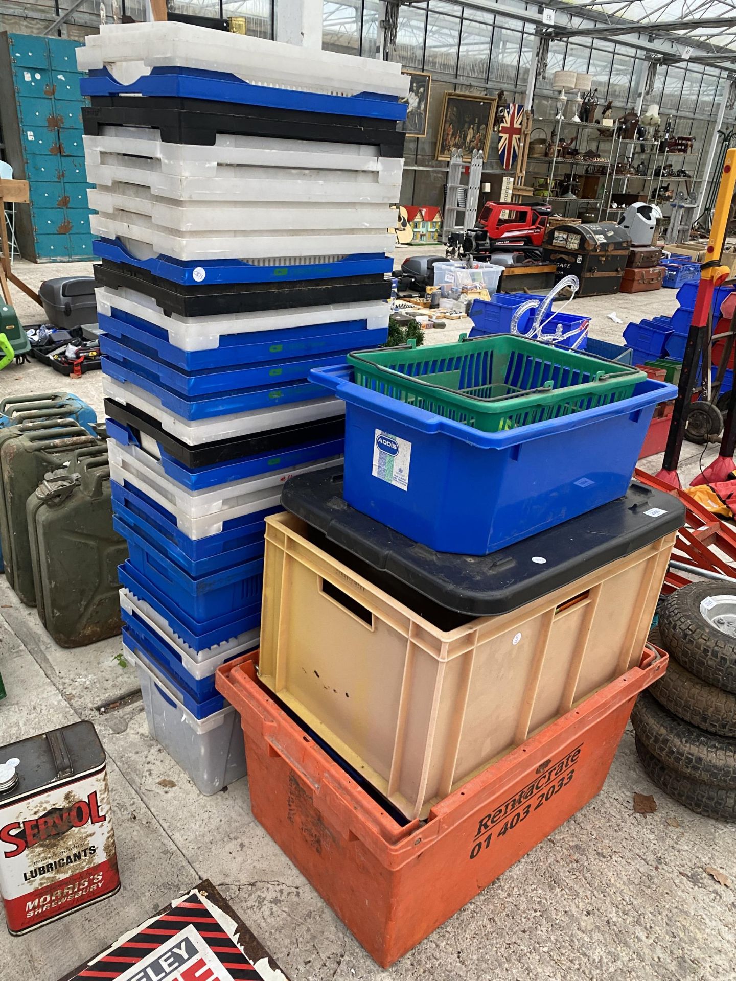 A LARGE QUANTITY OF PLASTIC STORAGE BOXES