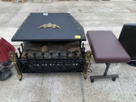 A DECORATIVE ELECTRIC FIRE AND STOOL