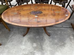A MODERN OVAL YEW WOOD COFFEE TABLE WITH FLORAL PAINTING TO THE TOP