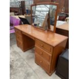 A RETRO TEAK STAG PEDESTAL DRESSING TABLE WITH TRIPLE MIRROR, 56" WIDE