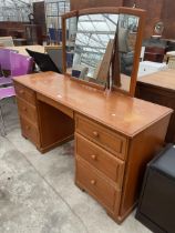 A RETRO TEAK STAG PEDESTAL DRESSING TABLE WITH TRIPLE MIRROR, 56" WIDE