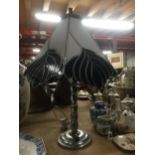 A CHROME EFFECT TABLE LAMP WITH TIFFANY STYLE SHADE