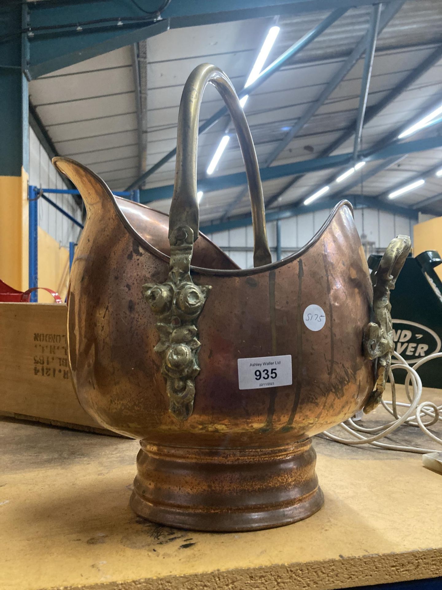 A VINTAGE COPPER AND BRASS COAL BUCKET