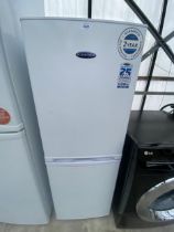 A WHITE ICEKING UPRIGHT FRIDGE FREEZER