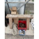 AN ASSORTMENT OF ITEMS TO INCLUDE A BUILDERS TRESTLE, BLOCK AND TACKLE AND ROPE ETC