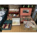 A LARGE LOT OF COSTUME JEWELLERY IN JEWELLERY STORAGE CASES