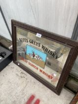 A FRAMED 'SCOTS GREYS WHISKY' MIRROR