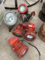 AN ASSORTMENTY OF VINTAGE VEHICLE SPOT LIGHTS