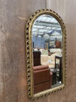 A MODERN GILT FRAMED WALL MIRROR, 34 X 19"