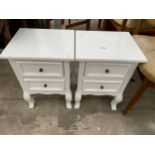 A PAIR OF MODERN WHITE BEDSIDE CHESTS